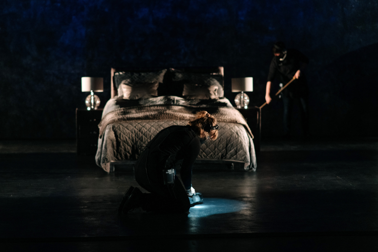 Production Arts student working on an empty stage
